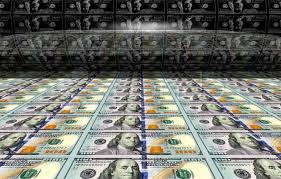 Hundred dollar bills, or other currency notes, being created in huge quantities on a money printing press machine often results in too much money creation and problems.